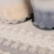 Tulle brodé festonné
