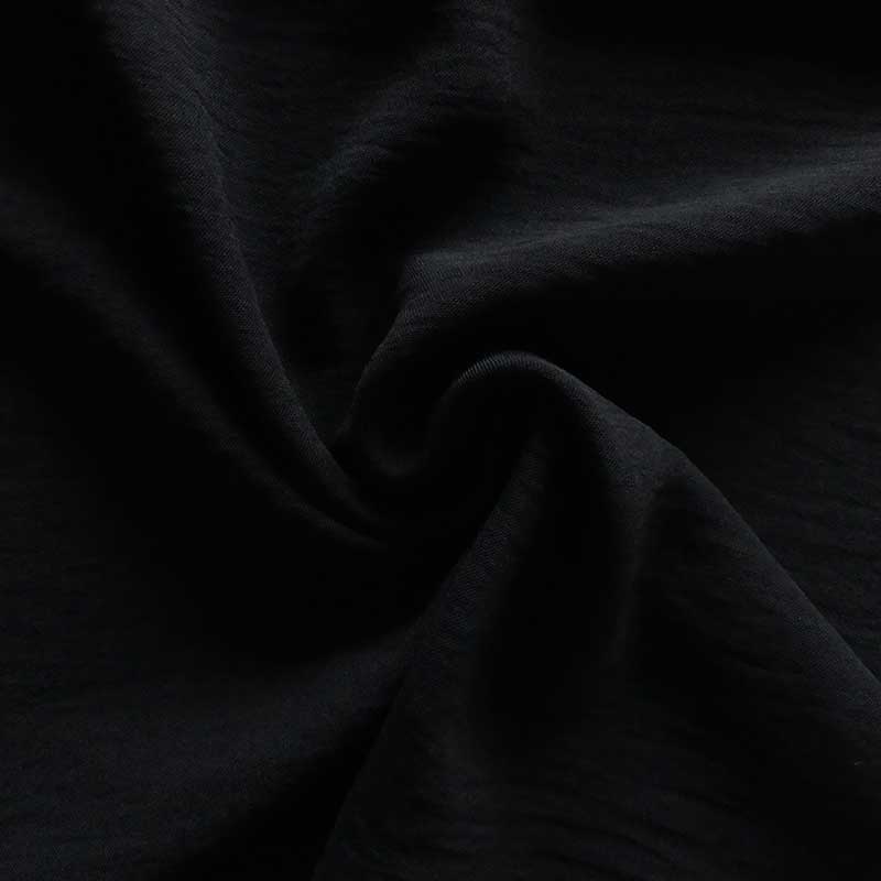 Tissu Polyester stretch Gaufré Soft Noir 