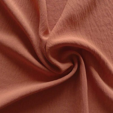 Tissu Polyester stretch Gaufré Soft Orange 