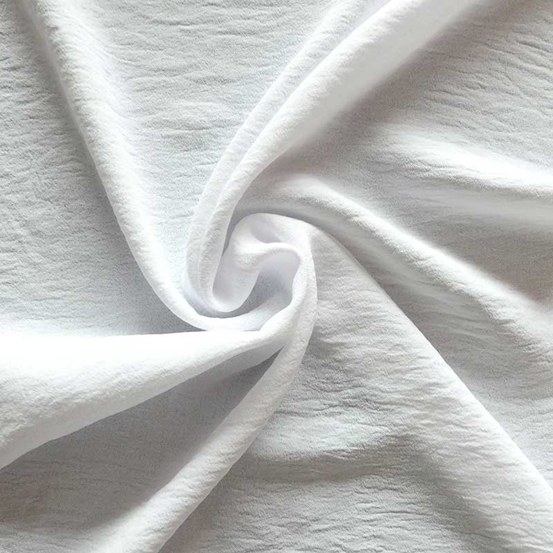 Tissu Polyester stretch Gaufré Soft Blanc 