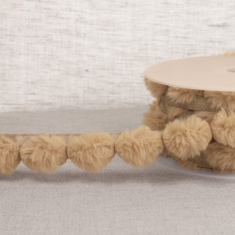 Bande de pompons fourrure synthetique