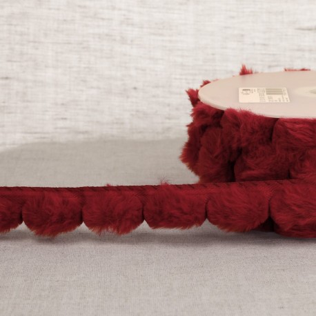 Bande de pompons fourrure synthetique