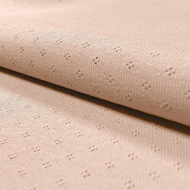 Tissu Jersey Ajouré Uni Nude Rose 