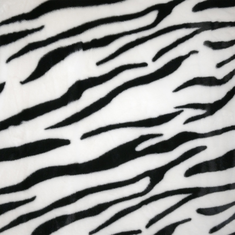 Tissu Fausse Fourrure Zebra Ras Noir