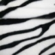 Tissu Fausse Fourrure Zebra Ras Noir